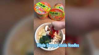 There is a big whole sausage inside the instant noodles.