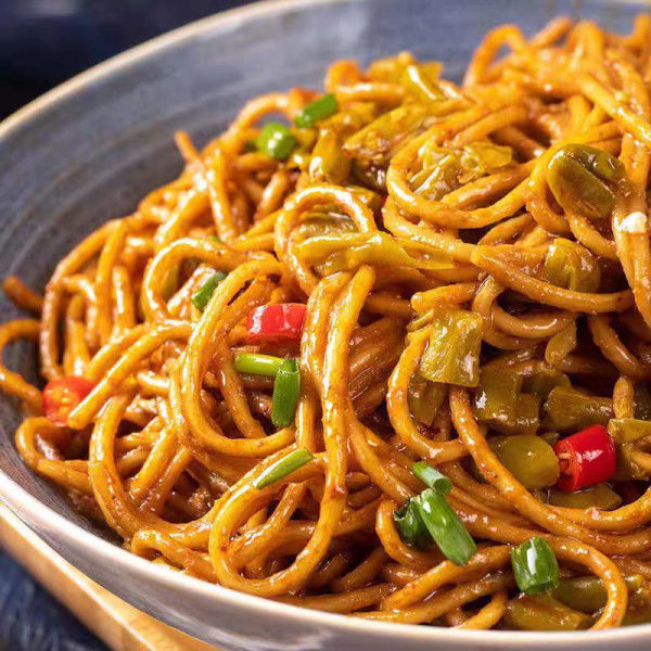Indulge In The Perfect Combination Of Sesame Sauce And A Little Kick Of Spice In Vegetarian Spaghetti